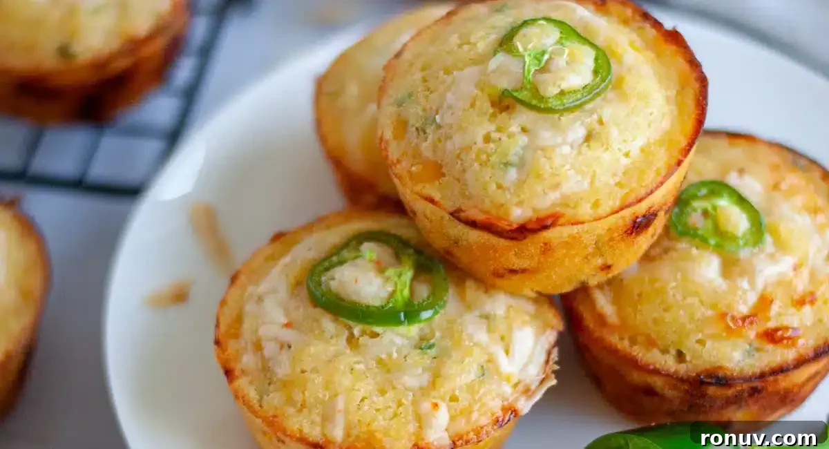 What to Serve with Taco Soup: 20 Toppings and Sides 5 Up close image of jalapeno cheddar cornbread muffins on white dish.