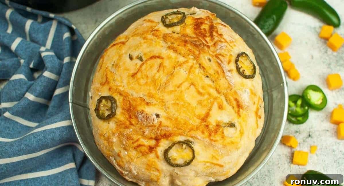 What to Serve with Taco Soup: 20 Toppings and Sides 6 Overhead image of dutch oven jalapeno cheddar bread in silver tin dish.