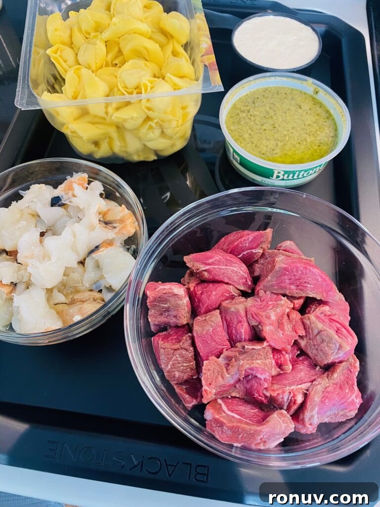 Blackstone Griddle Surf and Turf Tortellini Recipe 3 prepped ingredients on a tray