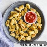 20 Creative Sides to Serve with Soup Beyond Bread 16 Veggie tots on a blue platter.
