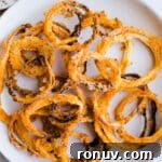 20 Creative Sides to Serve with Soup Beyond Bread 17 A plate full of onion strings.