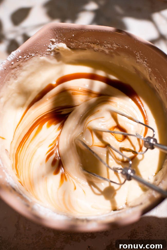 Gooey Caramel Apple Butter Cake Recipe 11 Spreading topping