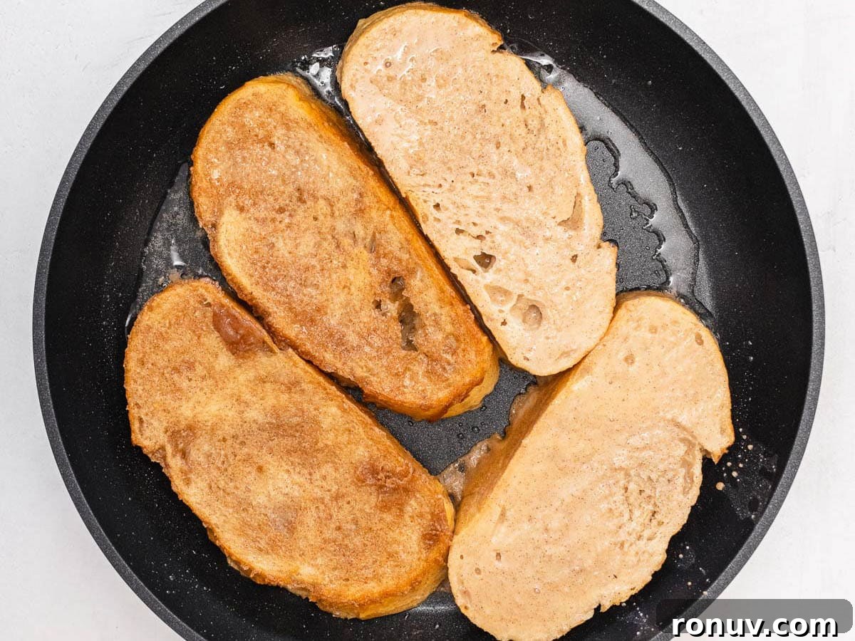 Vegan French Toast Recipe with Cinnamon Maple Syrup 10 slices of bread frying in a black skillet