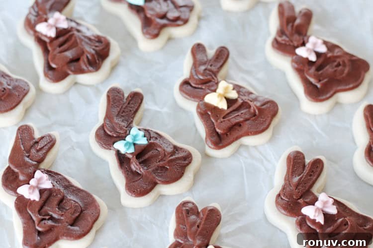 25 Easter Desserts to Impress Your Guests 11 chocolate bunny cookies on parchment paper