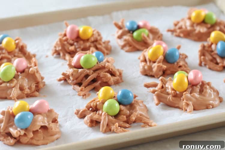 25 Easter Desserts to Impress Your Guests 13 butterscotch birds nest cookies on cookie sheet