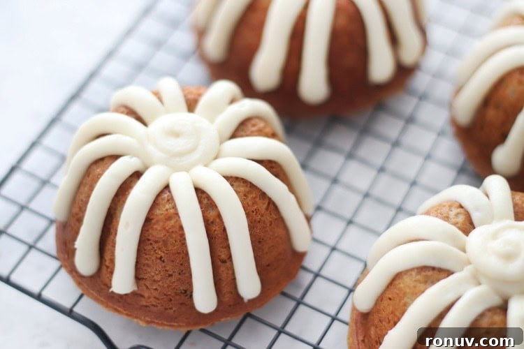 25 Easter Desserts to Impress Your Guests 19 mini carrot bundt cakes on cooling rack