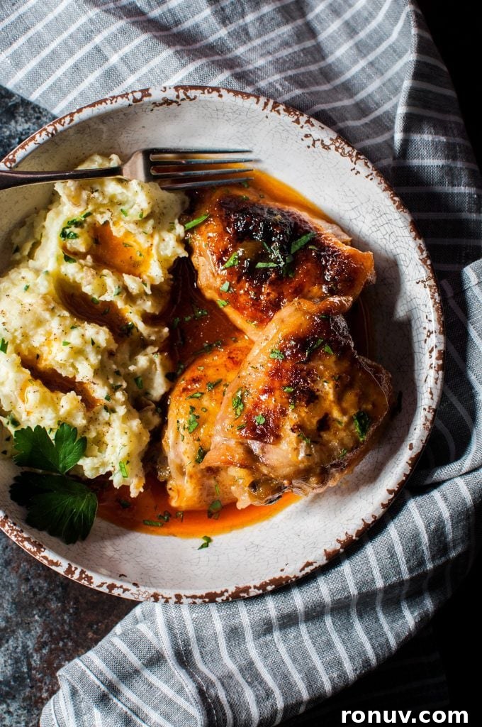 Crispy Braised Chicken with Apricot Glaze 2 plate with crispy braised apricot chicken and mashed potatoes and a fork