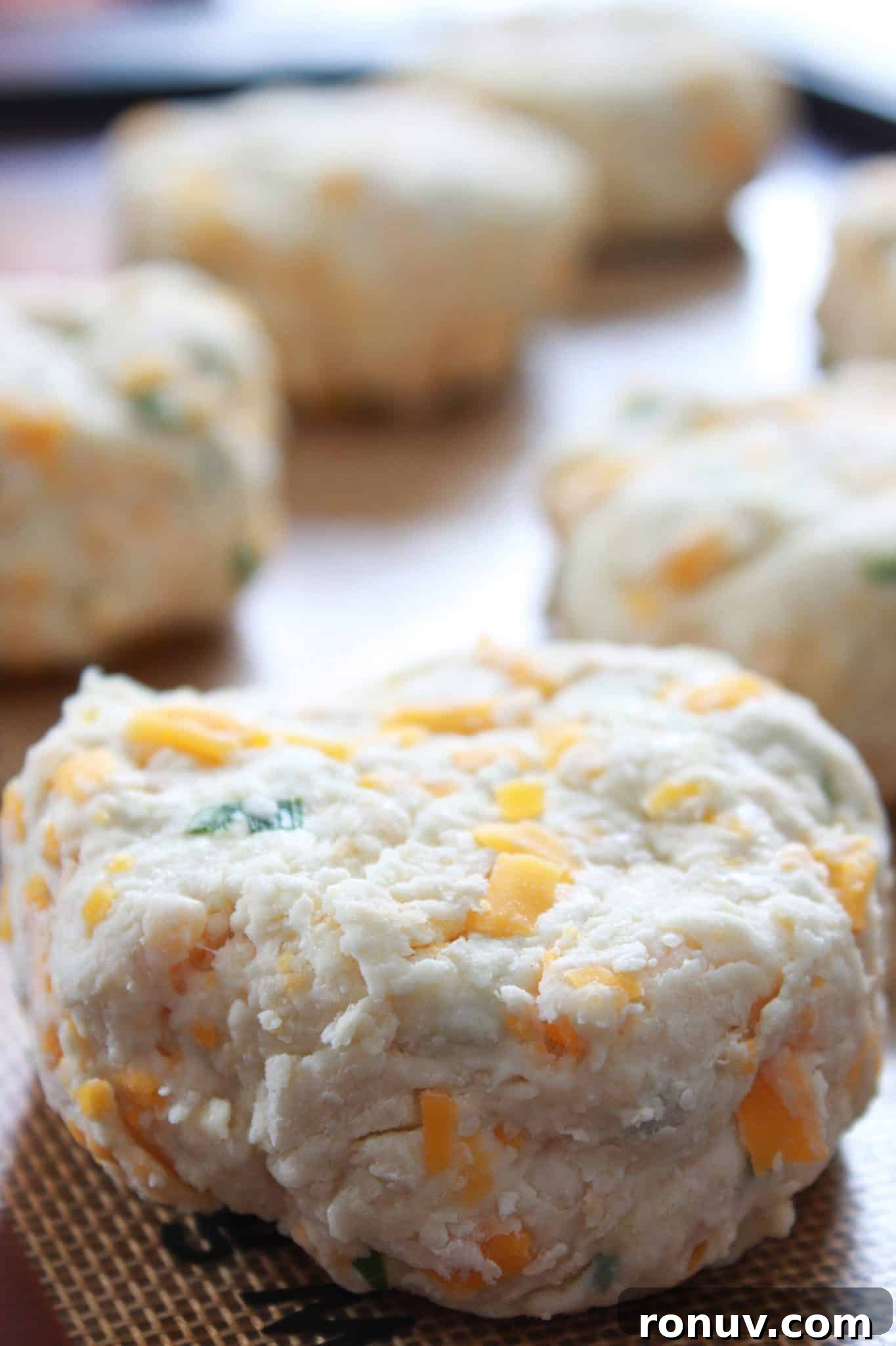Mini Cheddar and Chive Irish Soda Bread Recipe 7 The soda breads on a tray and ready to bake.