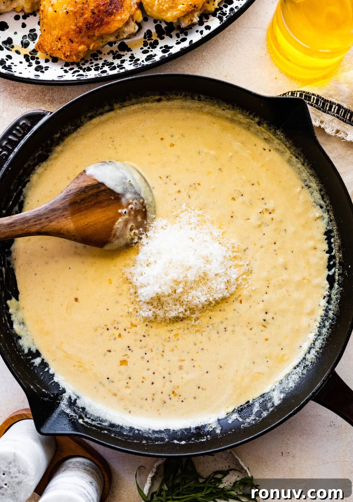Pan-Seared Chicken Thighs in Creamy Mustard Sauce 11 How to make chicken thighs with creamy mustard sauce recipe- add the heavy cream and the cheese.