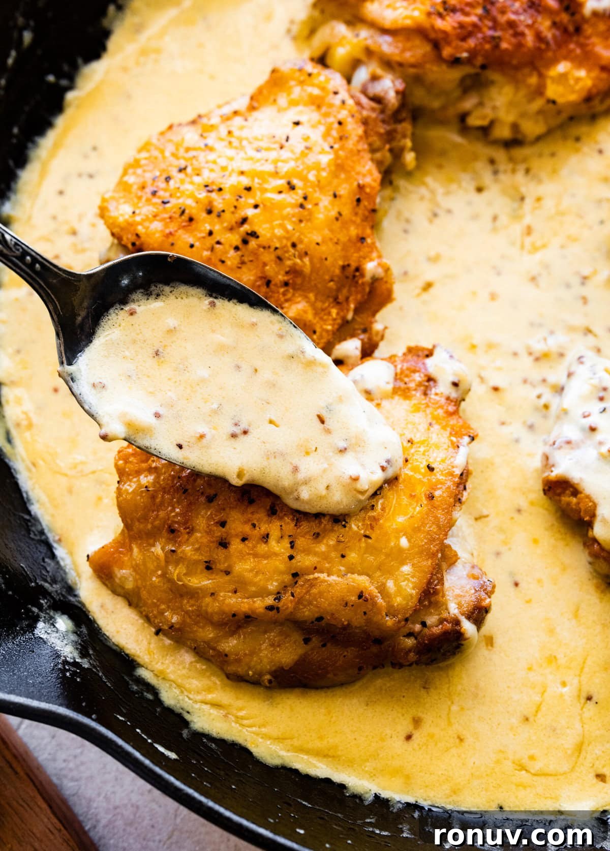 Pan-Seared Chicken Thighs in Creamy Mustard Sauce 12 How to make chicken thighs with creamy mustard sauce recipe- pour the sauce over the chicken.