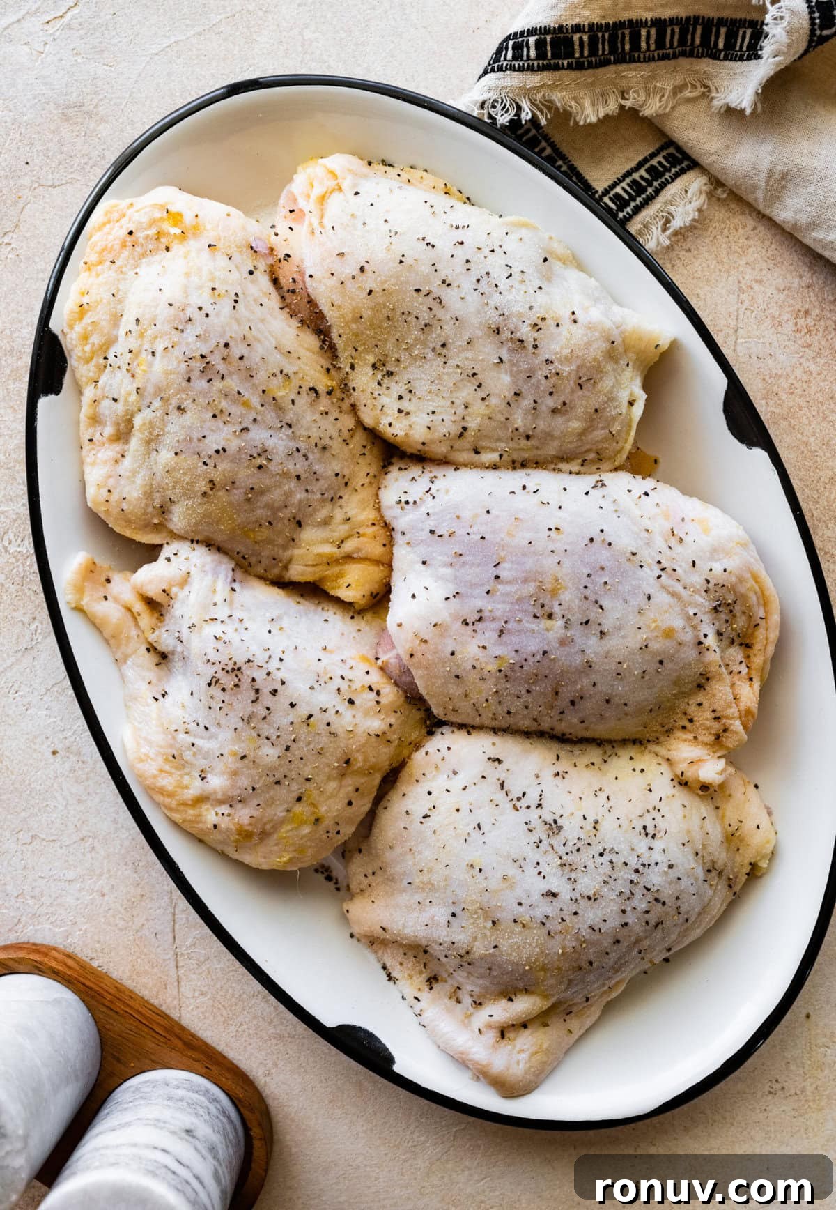 Pan-Seared Chicken Thighs in Creamy Mustard Sauce 6 How to make chicken thighs with creamy mustard sauce recipe- season the chicken.