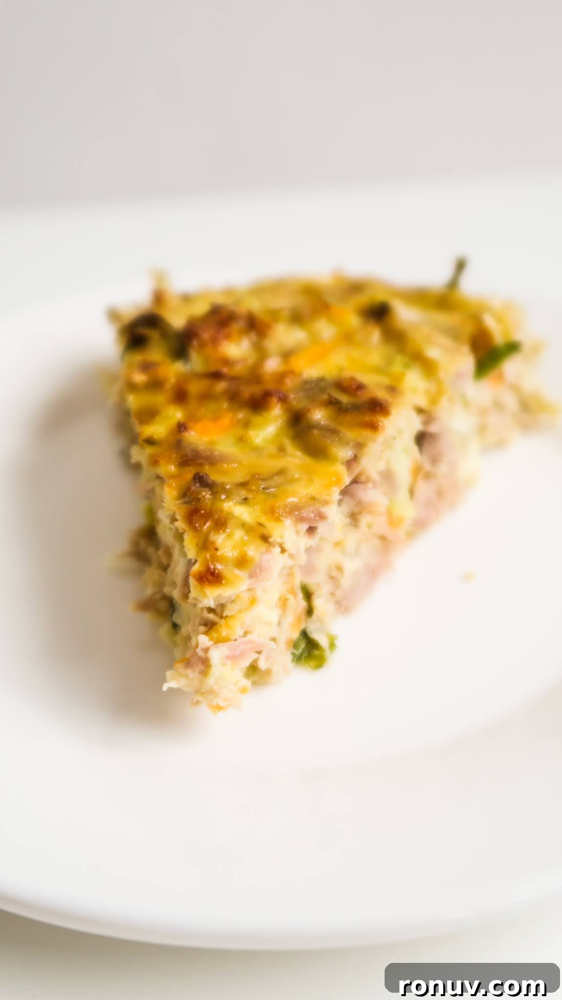 This crustless tuna breakfast quiche recipe is healthy, so easy to make and the perfect meal prep breakfast recipe. This quick and healthy savory breakfast idea is gluten free and also easily made low carb and dairy-free. Perfect easy canned tuna recipe and great for clean eating too!