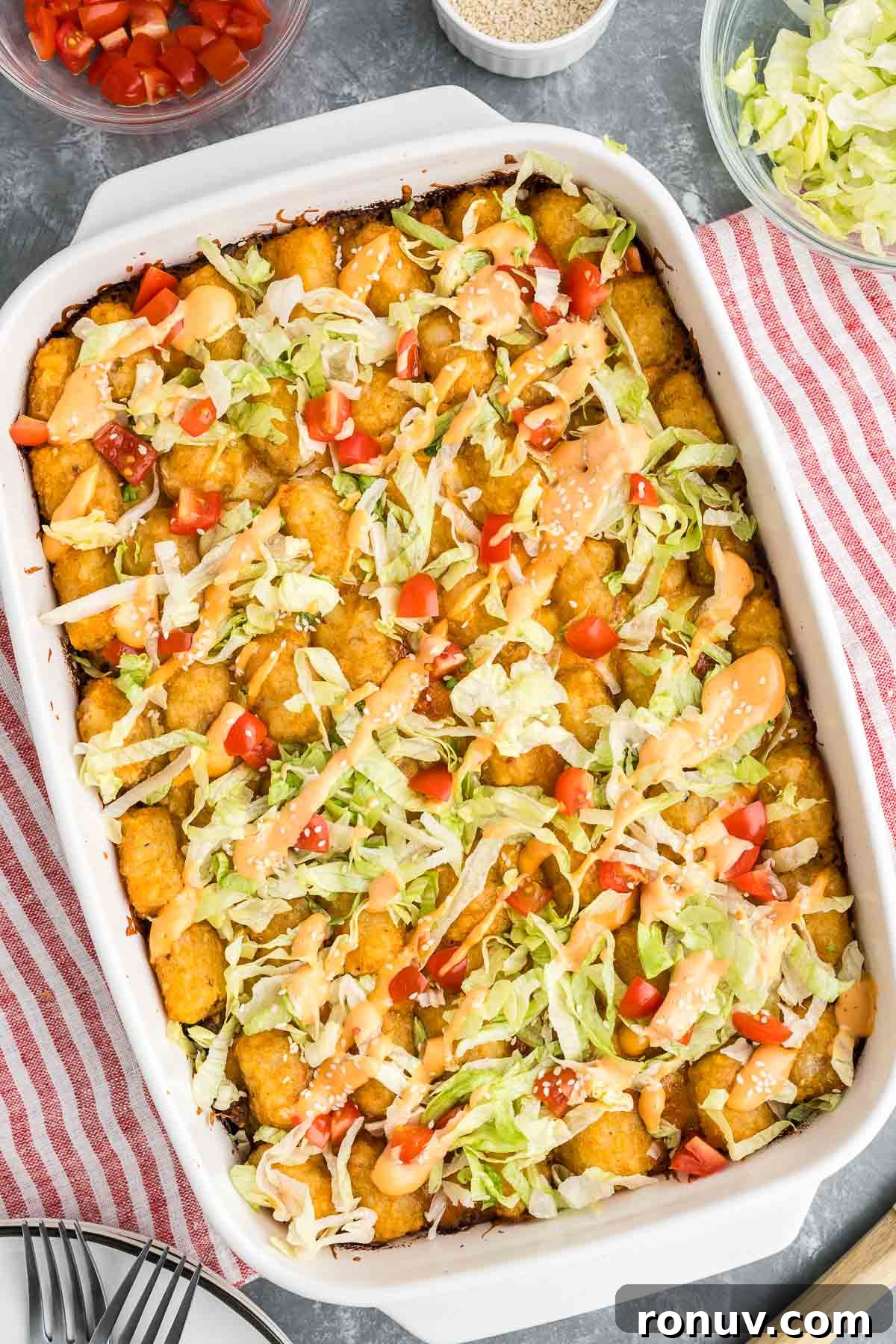 Big Mac-Style Tater Tot Casserole with Cheeseburger Sauce 2 big mac casserole in a dish