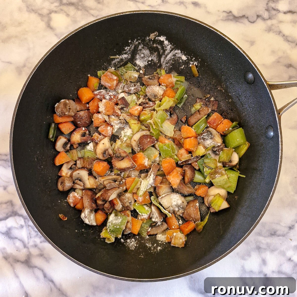 Turn Leftover Chicken Into Shepherd's Pie 7 Flour stirred into the vegetables in a saute pan.