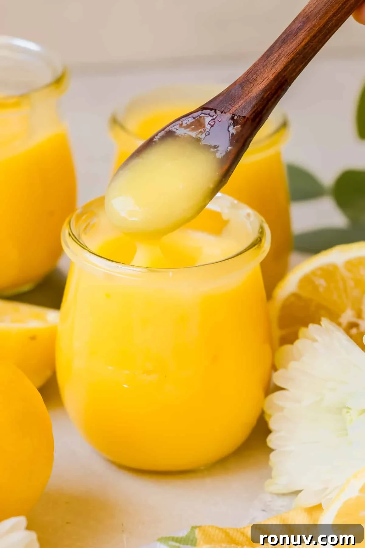 Silky Homemade Lemon Curd Recipe 9 curd in glass jars.