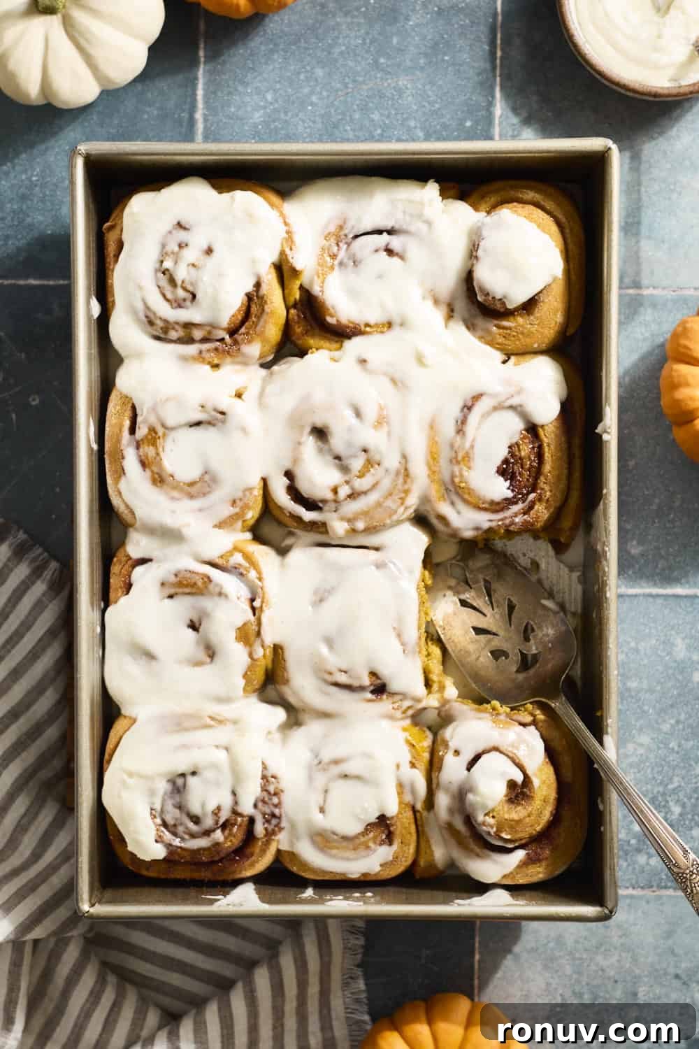 Pumpkin Cinnamon Rolls Recipe with Sourdough Discard 2 Sourdough Discard Pumpkin Cinnamon Rolls in a baking pan.