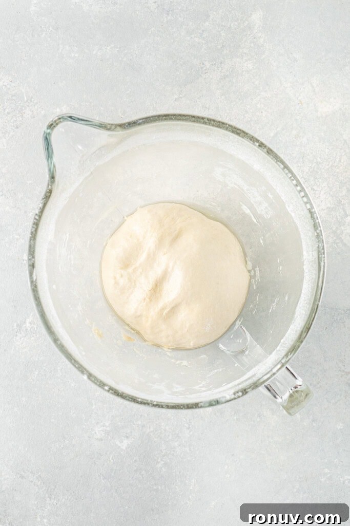 Grilled Greek Lamb Pitas with Tzatziki and Feta 5 The smooth dough in a glass bowl before rising.