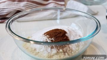 Gluten-Free Pumpkin Muffins That Taste Like Fall 7 Mixing dry ingredients in a clear glass bowl
