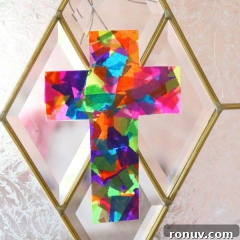 cross with coloured papers on