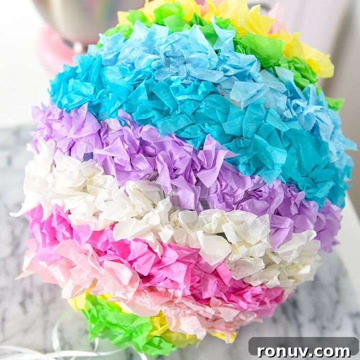 easter egg covered in different colours of scrunched up paper