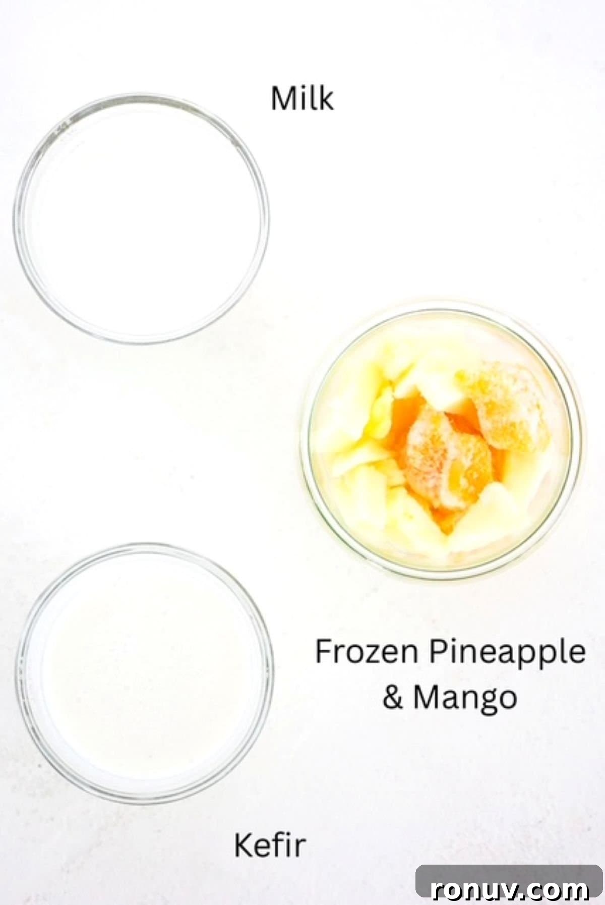 Tropical Mango Pineapple Smoothie Recipe 3 Mango Pineapple Smoothie ingredients, labeled.
