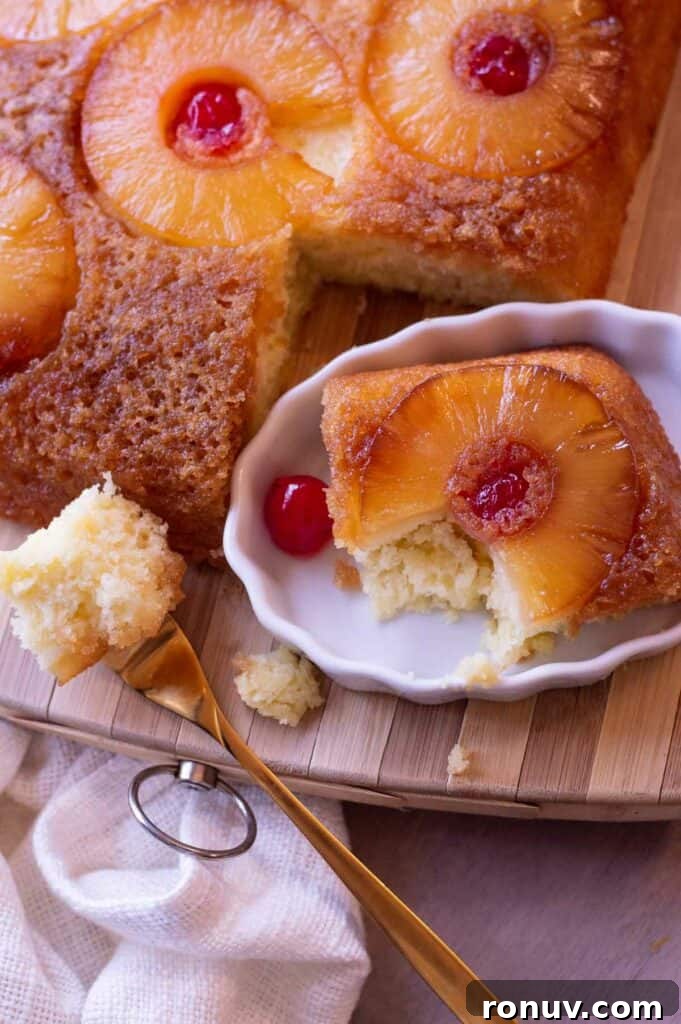 Gluten-Free Pineapple Upside-Down Cake Recipe 2 Gluten free pineapple upside down cake with pineapple rings and maraschino cherries