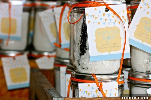 Homemade Vanilla Sugar in a Jar Stacked mason jars with Homemade Vanilla sugar and gift tags attached to each