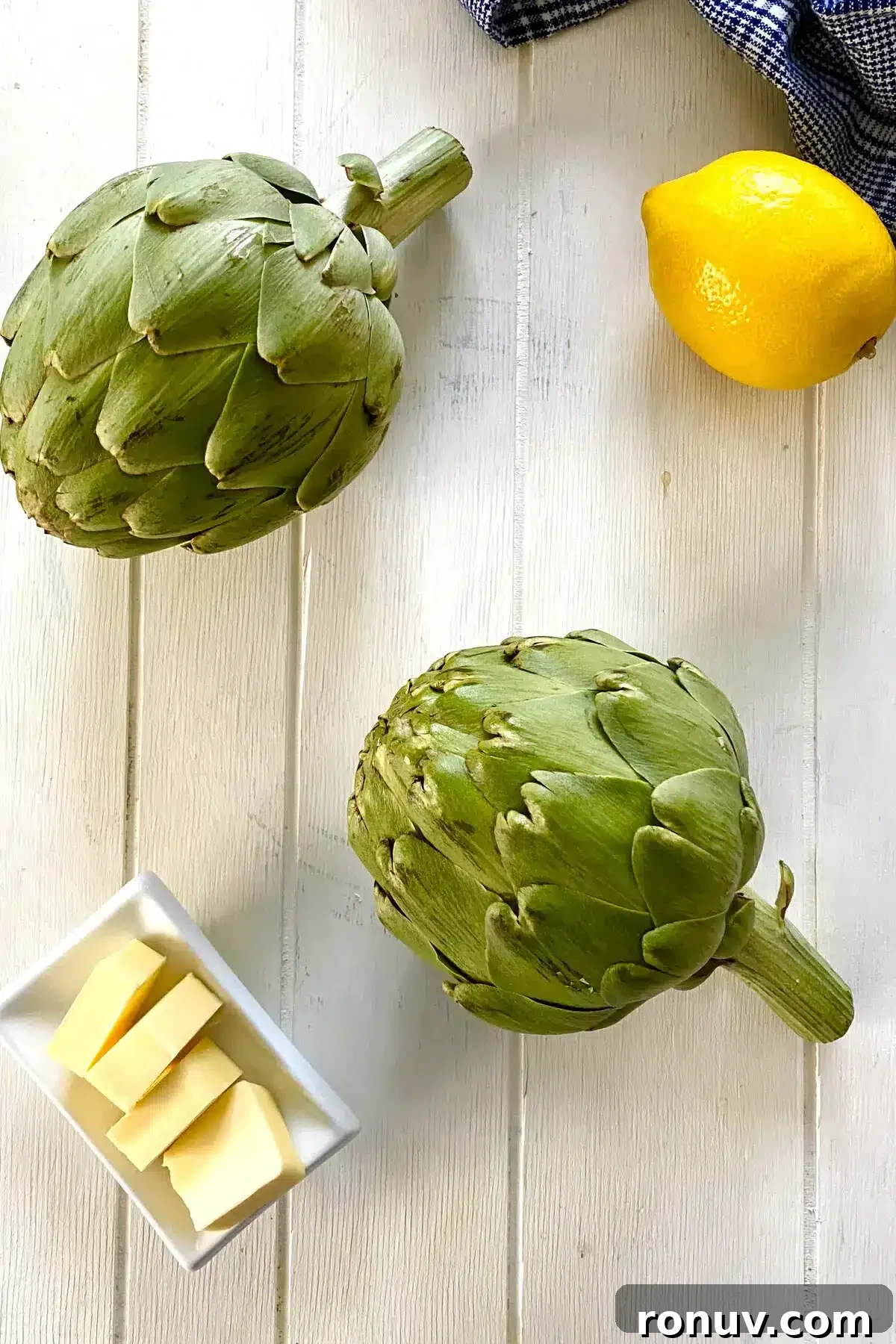 How to Cook Artichokes in the Microwave 4 2 artichokes, butter and a lemon.
