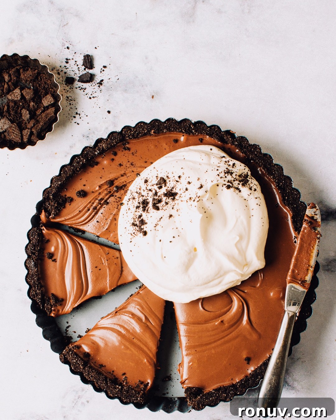 Valentine's Day Dessert Recipes for Date Night 13 No-bake chocolate tart topped with whipped cream.