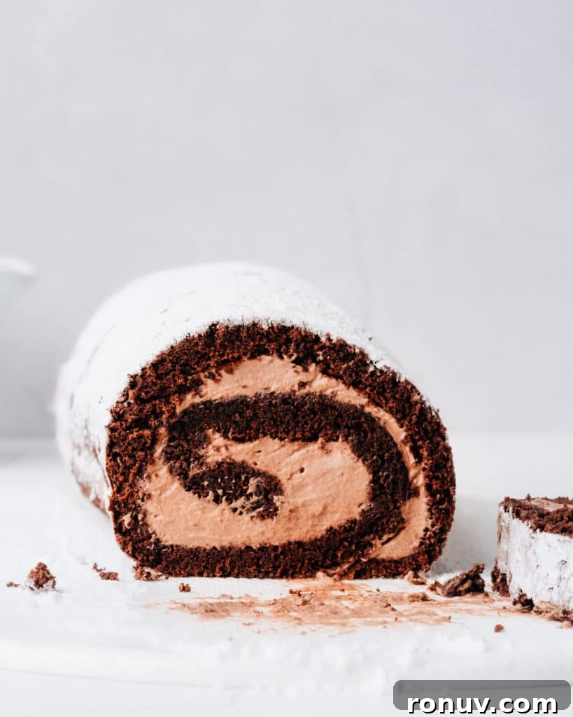 Valentine's Day Dessert Recipes for Date Night 15 Chocolate Swiss roll cake with chocolate cream filling.