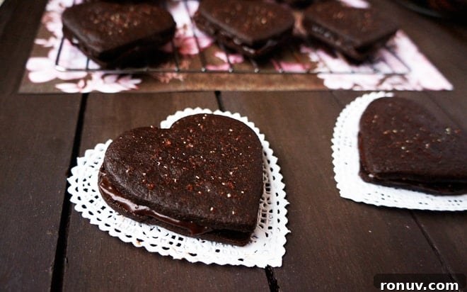 Valentine's Day Dessert Recipes for Date Night 3 Valentine's Day heart-shaped chocolate sandwich cookies.