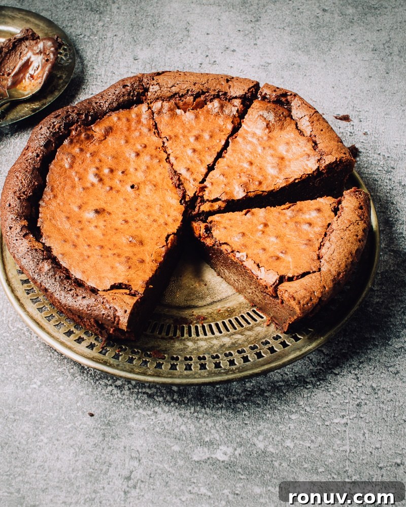 Valentine's Day Dessert Recipes for Date Night 5 Flourless chocolate cake cut into pieces