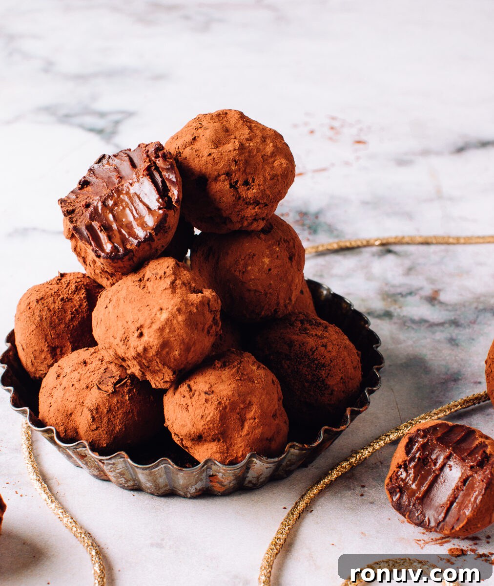 Valentine's Day Dessert Recipes for Date Night 6 Chocolate truffles coated in cocoa powder.