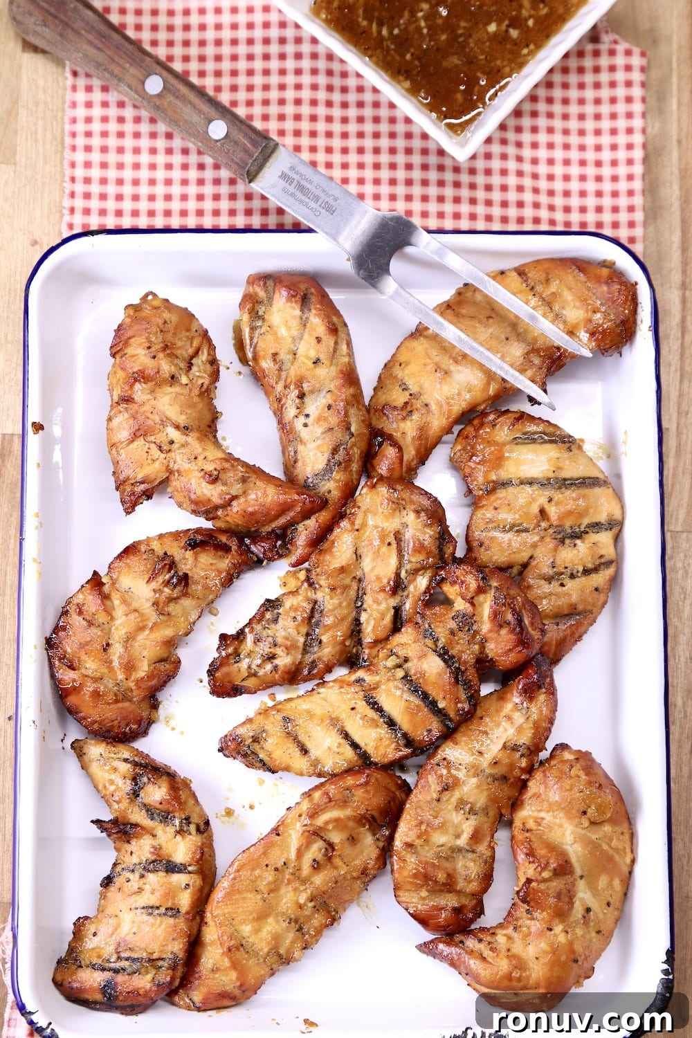 Sticky Apricot-Glazed BBQ Chicken Tenders 3 Grilled Chicken Tenders with a meat fork