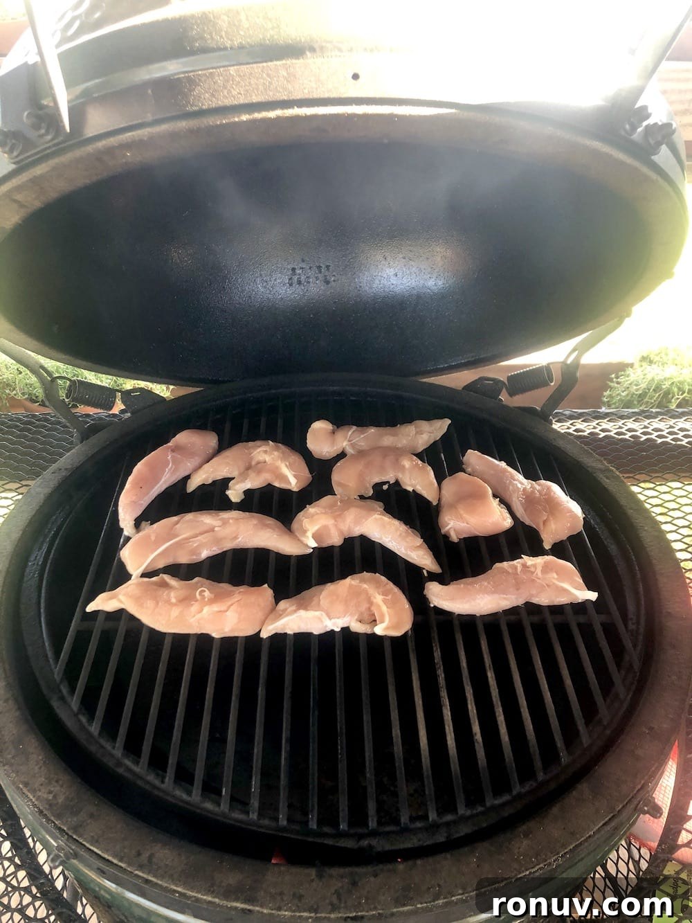 Sticky Apricot-Glazed BBQ Chicken Tenders 4 chicken tenders on a big green egg grill