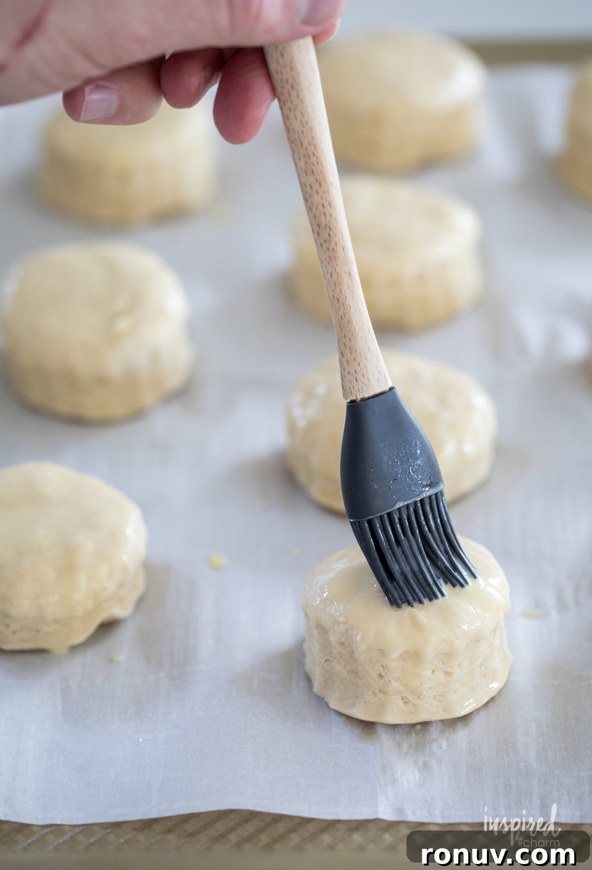 Classic Buttery Homemade Scones Recipe 11 pastry brush adding eggs wash to scones.
