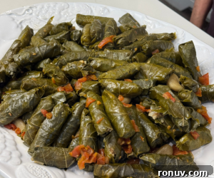 Authentic Warak Enab (Stuffed Grape Leaves) Recipe 14 Served warak enab on plate
