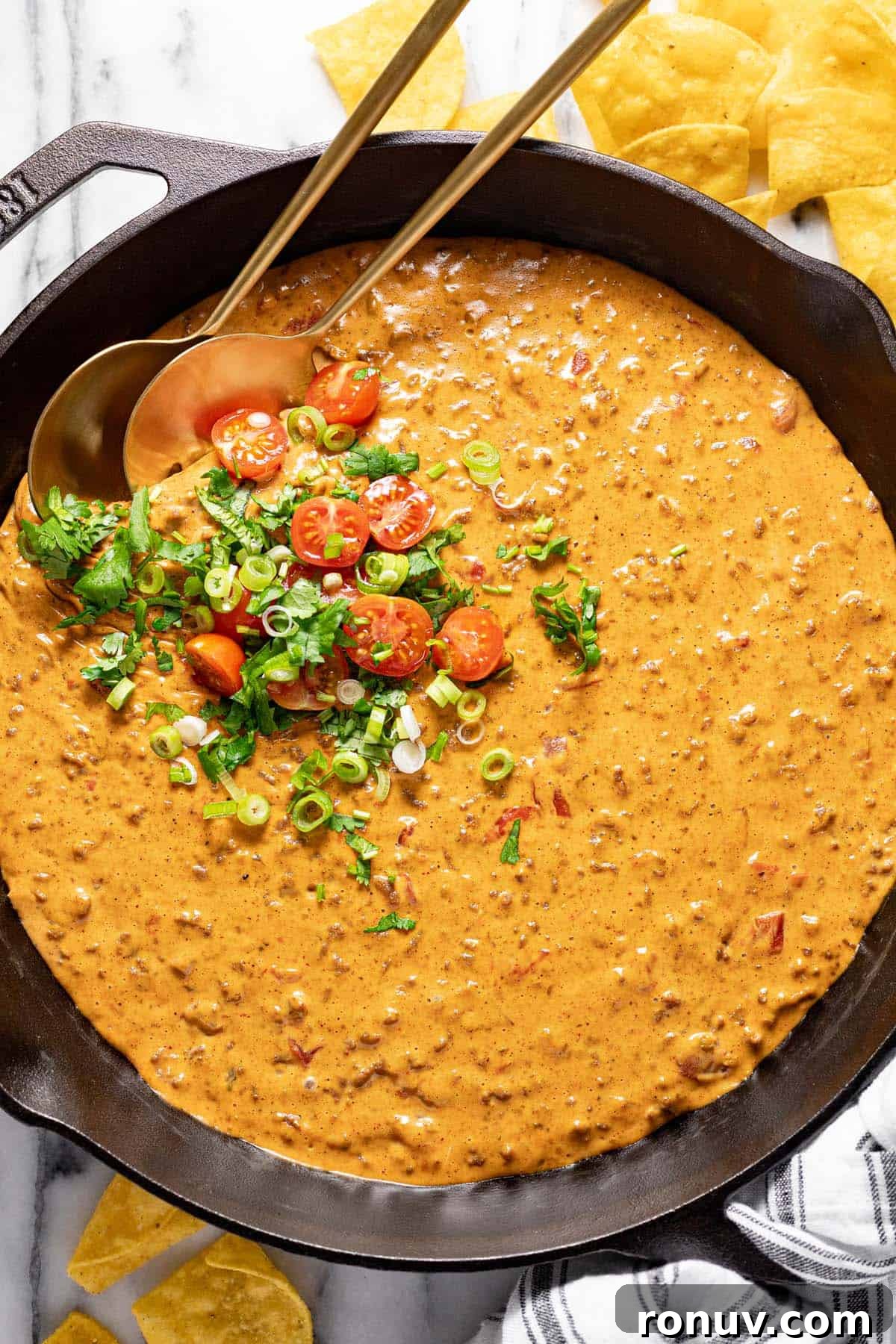 Creamy Cheesy Rotel Dip Recipe 2 Big cast iron pan filled with homemade cheesy Rotel dip.