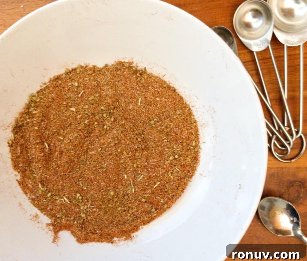 Homemade Chicken Taco Seasoning Mix for Bold Flavor 4 chicken taco seasoning spices mixed up in a bowl