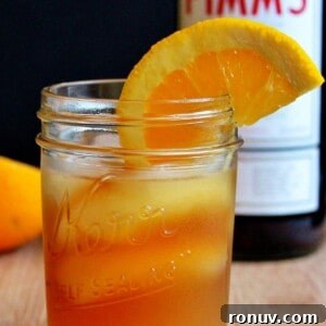 A glass of Pimm's sundowner on a cutting board.
