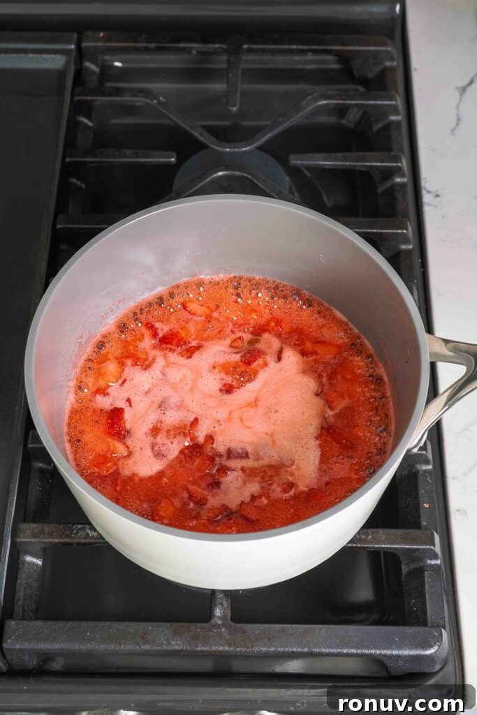 How to Make Small-Batch Strawberry Jam 6 Boiling strawberry jam in a pot.