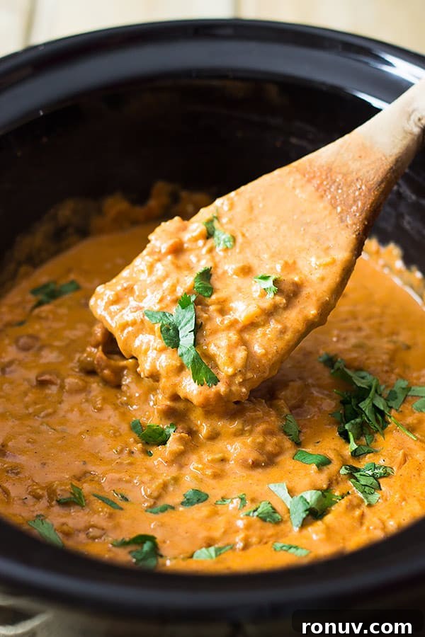 Creamy Homemade Chili Cheese Dip Recipe 2 This Homemade Chili Cheese Dip contains no processed cheese and no canned chili, just simple homemade goodness right in the slow cooker!! | www.countrysidecravings.com