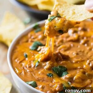 Creamy Homemade Chili Cheese Dip Recipe 3 This Homemade Chili Cheese Dip contains no processed cheese and no canned chili, just simple homemade goodness right in the slow cooker!! | www.countrysidecravings.com