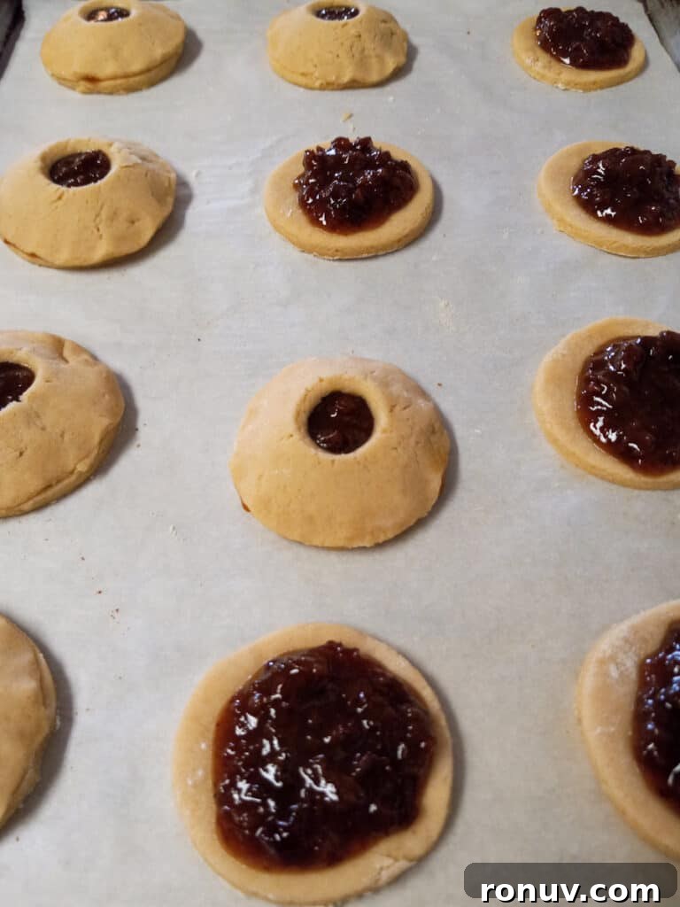 Amish Raisin-Filled Cookies: Old-Fashioned Homestyle Recipe 8 creating raisin-filled cookies on baking sheet